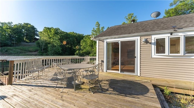 1145 Camp Branch Rd, Sunrise Beach, MO 65079 - wooden deck with outdoor dining space