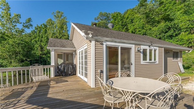 1145 Camp Branch Rd, Sunrise Beach, MO 65079 - wooden terrace featuring outdoor dining space