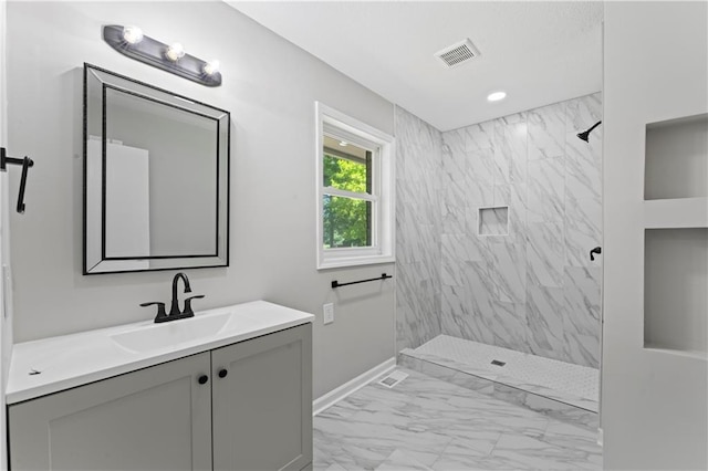 2081 Willow Ln, Excelsior Springs, MO 64024 - full bath featuring marble finish flooring, vanity, a marble finish shower, and baseboards