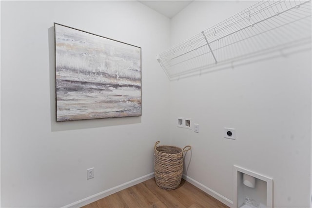 27101 E Oak View Dr, Lees Summit, MO 64086 - laundry room with electric dryer hookup, washer hookup, wood finished floors, and baseboards