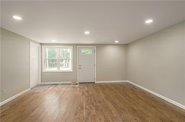 5539 NW Adrian Ave, Houston Lake, MO 64151 - entryway with wood finished floors and recessed lighting