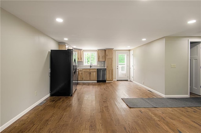 5539 NW Adrian Ave, Houston Lake, MO 64151 - kitchen featuring stainless steel refrigerator with ice dispenser, dishwasher, wood finished floors, recessed lighting, and light countertops