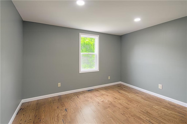 5539 NW Adrian Ave, Houston Lake, MO 64151 - unfurnished room with light wood finished floors and recessed lighting