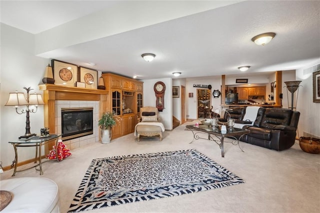 15471 Cedar Ln, Basehor, KS 66007 - living area with light carpet and a tiled fireplace