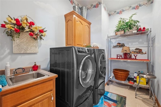 15471 Cedar Ln, Basehor, KS 66007 - laundry room with washer and dryer, light tile patterned floors, and cabinet space
