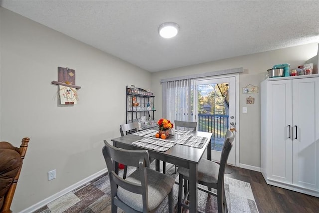 3620 S Northern Blvd, Independence, MO 64052 - dining room with baseboards, dark wood-style floors, and a textured ceiling