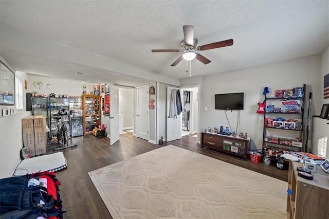 3620 S Northern Blvd, Independence, MO 64052 - bedroom with wood finished floors, a textured ceiling, and ceiling fan