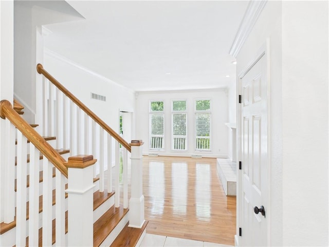 503 Quail Trl, Warrensburg, MO 64093 - stairs with ornamental molding and wood finished floors
