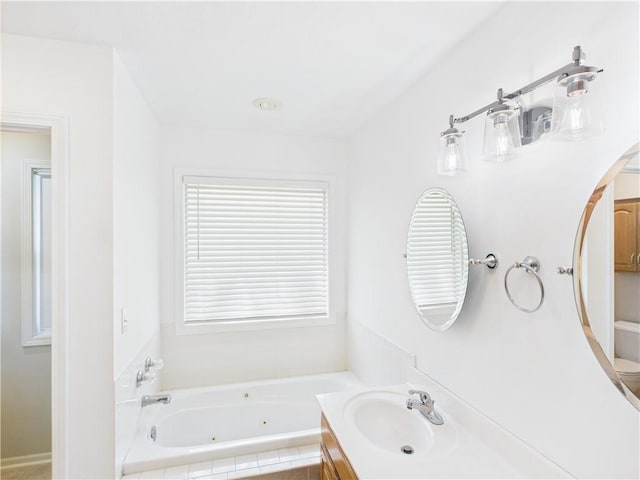 503 Quail Trl, Warrensburg, MO 64093 - full bath featuring a jetted tub and vanity