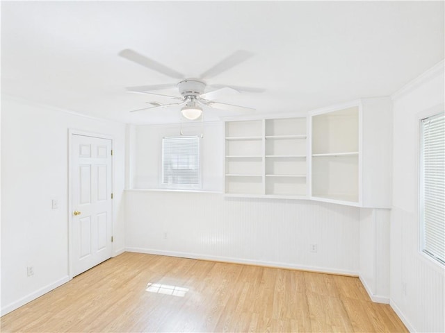 503 Quail Trl, Warrensburg, MO 64093 - unfurnished room featuring wood finished floors and ceiling fan
