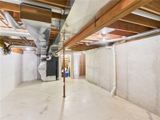 503 Quail Trl, Warrensburg, MO 64093 - unfinished below grade area featuring heating unit