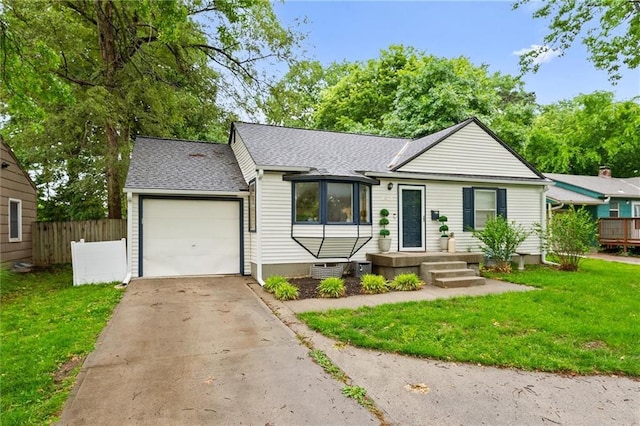 2912 W 75th St, Prairie Village, KS 66208 - ranch-style house featuring an attached garage, driveway, and roof with shingles
