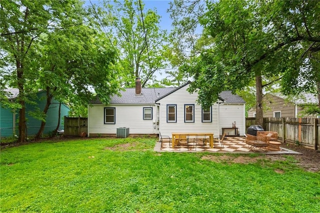 2912 W 75th St, Prairie Village, KS 66208 - rear view of property featuring a patio area, a chimney, and roof with shingles