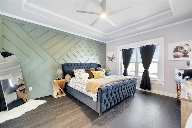 905 SE Wood Ridge Ct, Blue Springs, MO 64014 - bedroom featuring a raised ceiling, dark wood-type flooring, ornamental molding, baseboards, and a ceiling fan