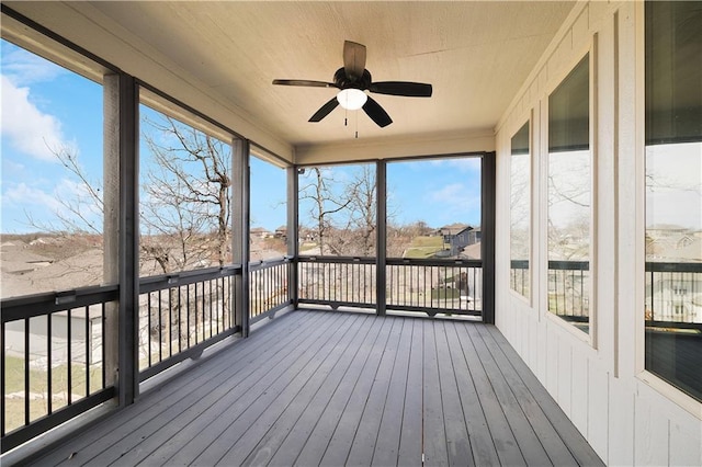 905 SE Wood Ridge Ct, Blue Springs, MO 64014 - unfurnished sunroom featuring a ceiling fan