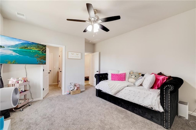 905 SE Wood Ridge Ct, Blue Springs, MO 64014 - bedroom featuring carpet, baseboards, and a ceiling fan