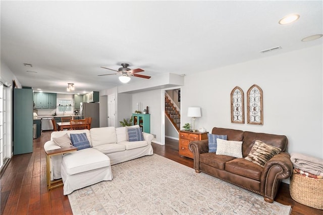 2708 Lawrence Ave, Lawrence, KS 66047 - living area with ceiling fan, dark wood-style floors, recessed lighting, and stairs
