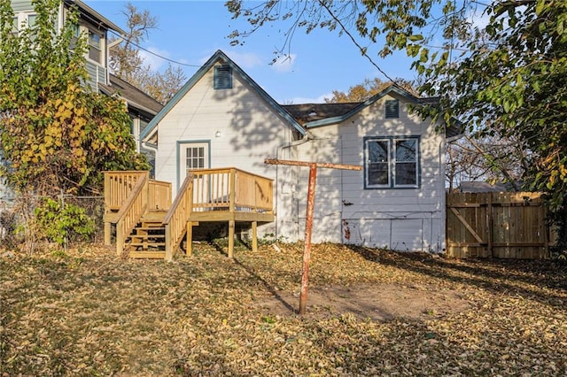 4224 Monroe Ave, Kansas City, MO 64130 - back of house featuring a deck