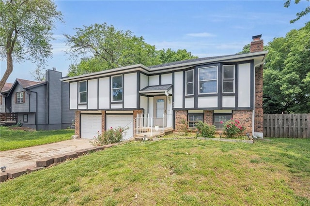 838 E 125th Ter, Olathe, KS 66061 - raised ranch featuring brick siding, a garage, a chimney, and concrete driveway