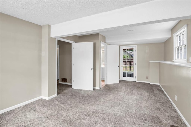 838 E 125th Ter, Olathe, KS 66061 - carpeted spare room with baseboards and a textured ceiling