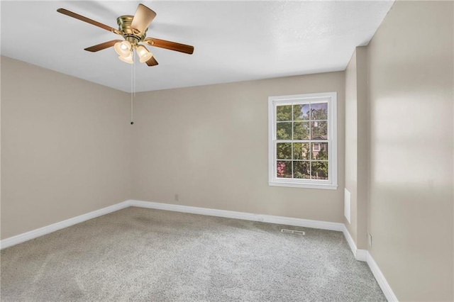 838 E 125th Ter, Olathe, KS 66061 - empty room featuring carpet floors, baseboards, and a ceiling fan