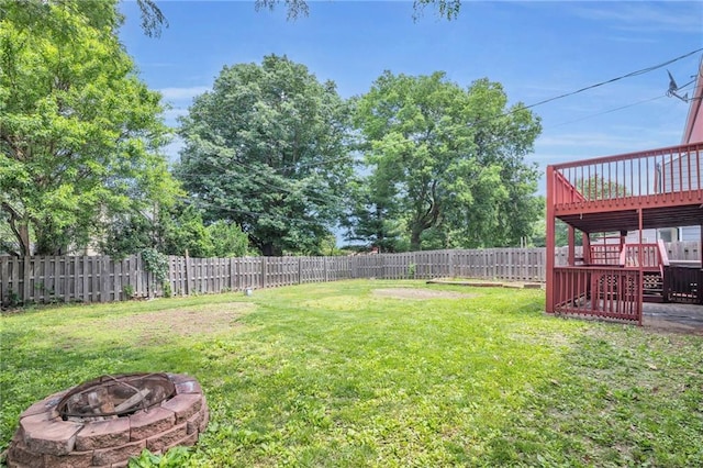 838 E 125th Ter, Olathe, KS 66061 - view of yard with an outdoor fire pit, a wooden deck, and stairs
