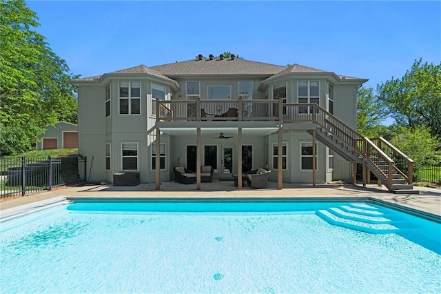 17105 Bo Cir, Tonganoxie, KS 66086 - view of pool featuring stairs, a patio area, ceiling fan, and an outdoor hangout area