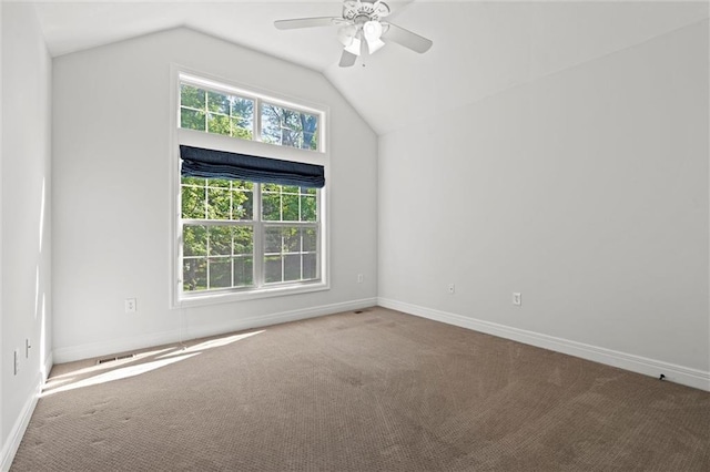 17105 Bo Cir, Tonganoxie, KS 66086 - carpeted empty room with ceiling fan, lofted ceiling, and baseboards