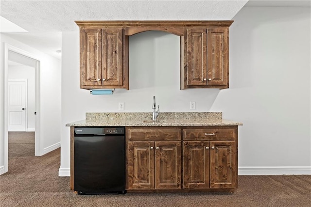 17105 Bo Cir, Tonganoxie, KS 66086 - kitchen with black dishwasher, dark carpet, baseboards, light stone counters, and a sink
