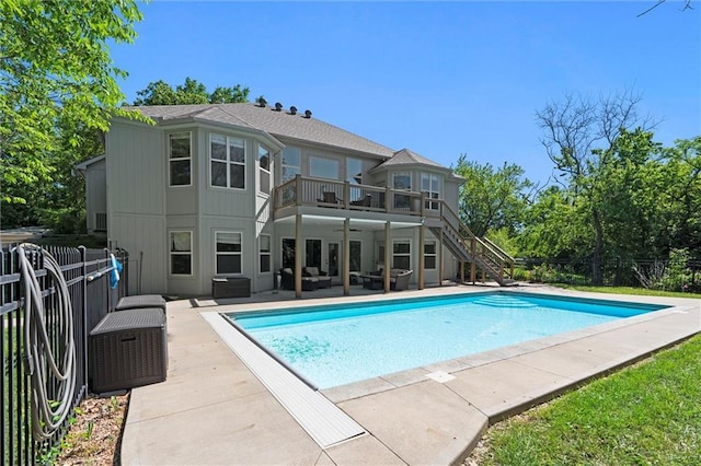 17105 Bo Cir, Tonganoxie, KS 66086 - view of swimming pool with stairs, a patio area, and an outdoor living space