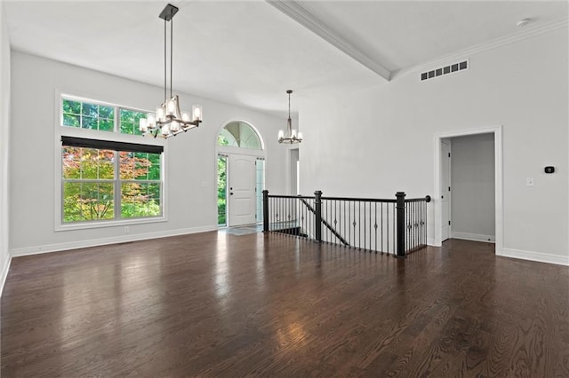 17105 Bo Cir, Tonganoxie, KS 66086 - empty room with a chandelier, wood finished floors, and baseboards