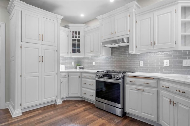 15618 Meadowbrook Ct, Raymore, MO 64083 - kitchen featuring stainless steel range with gas cooktop, under cabinet range hood, white cabinetry, dark wood-style flooring, and recessed lighting