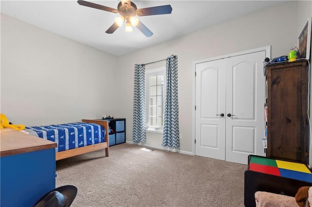 15618 Meadowbrook Ct, Raymore, MO 64083 - bedroom featuring carpet flooring, baseboards, a closet, and ceiling fan