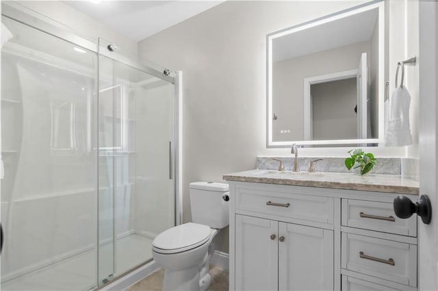 15618 Meadowbrook Ct, Raymore, MO 64083 - full bathroom featuring vanity, toilet, and a stall shower
