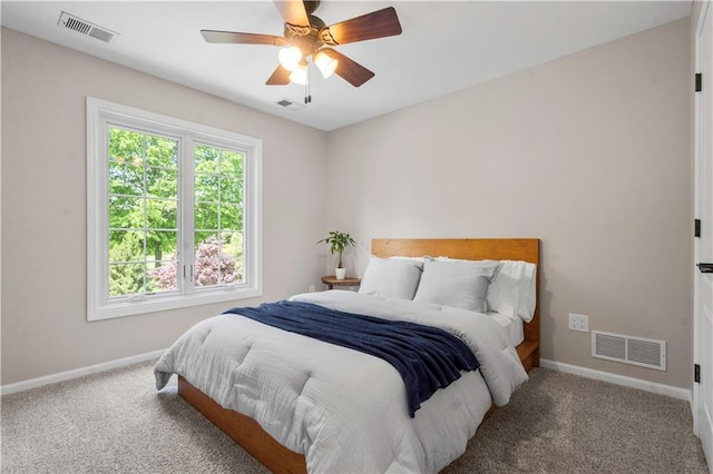 15618 Meadowbrook Ct, Raymore, MO 64083 - bedroom with baseboards, carpet, and ceiling fan
