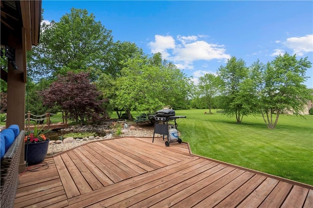 15618 Meadowbrook Ct, Raymore, MO 64083 - deck with a grill and a yard