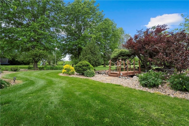 15618 Meadowbrook Ct, Raymore, MO 64083 - view of grassy yard with view of scattered trees