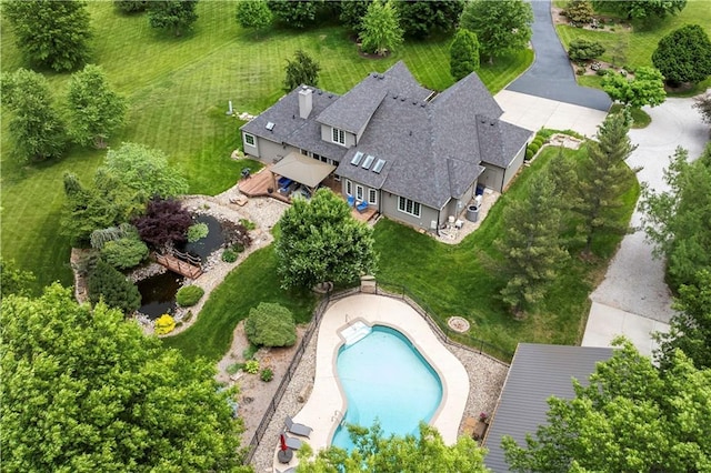 15618 Meadowbrook Ct, Raymore, MO 64083 - view from above of property with a pool area