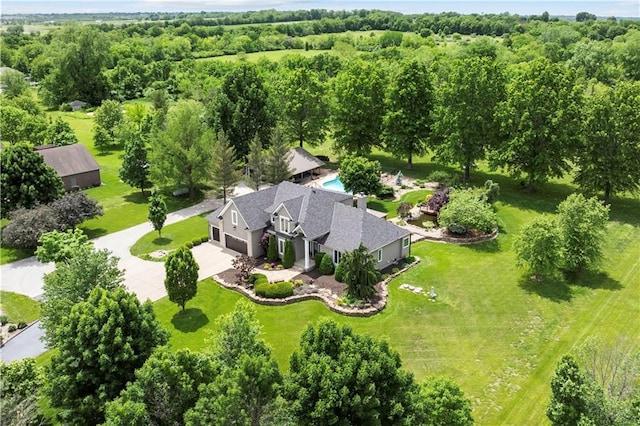15618 Meadowbrook Ct, Raymore, MO 64083 - view of subject property with a forest