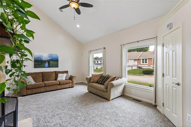 14401 Craig Ave, Grandview, MO 64030 - living area with carpet floors, a ceiling fan, baseboards, vaulted ceiling, and recessed lighting