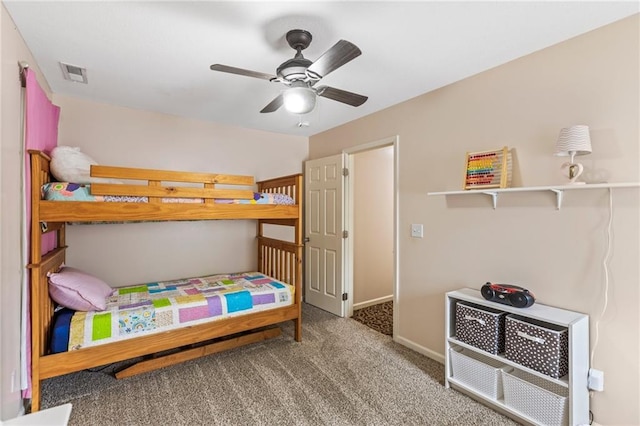 14401 Craig Ave, Grandview, MO 64030 - carpeted bedroom featuring baseboards and a ceiling fan