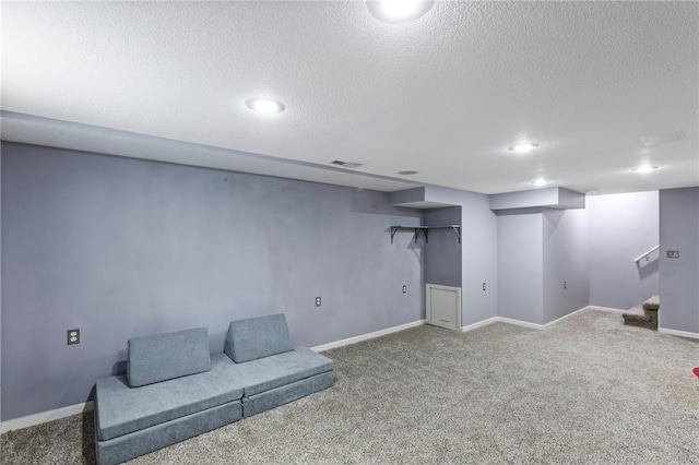 14401 Craig Ave, Grandview, MO 64030 - unfurnished room featuring a textured ceiling, carpet, stairway, baseboards, and recessed lighting