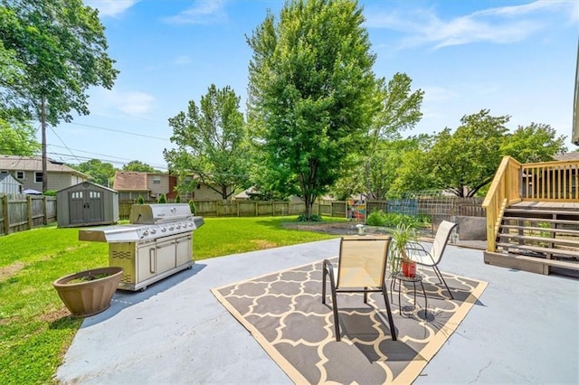 811 W 86th Ter, Kansas City, MO 64114 - fenced backyard featuring a storage unit, a patio, outdoor dining space, and a deck