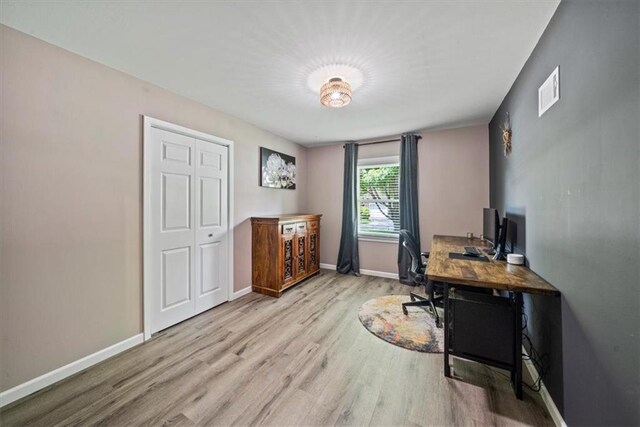 811 W 86th Ter, Kansas City, MO 64114 - office space featuring wood finished floors and baseboards