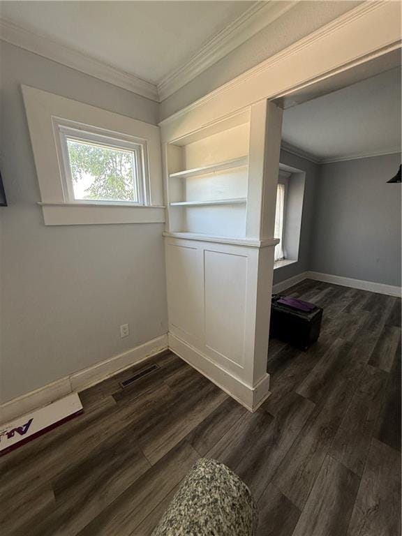 418 N 8th St, Independence, KS 67301 - unfurnished room with ornamental molding, dark wood-style flooring, and baseboards