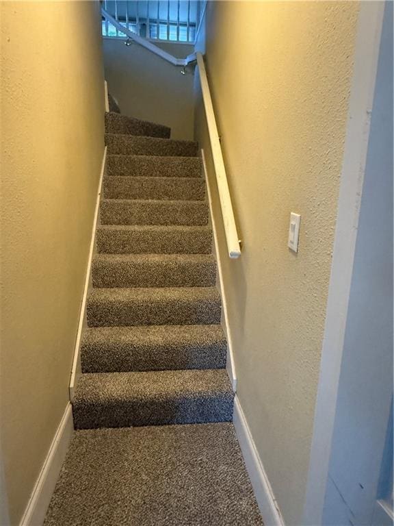 418 N 8th St, Independence, KS 67301 - stairway with carpet floors and baseboards