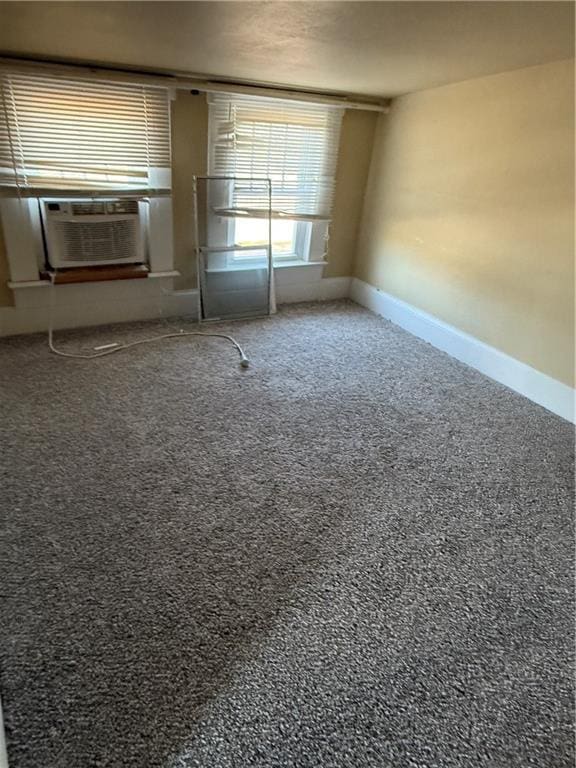 418 N 8th St, Independence, KS 67301 - empty room featuring baseboards and cooling unit