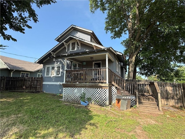 418 N 8th St, Independence, KS 67301 - rear view of house featuring a deck