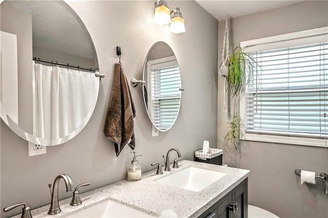 7041 Garnett St, Shawnee, KS 66203 - full bath with double vanity and toilet