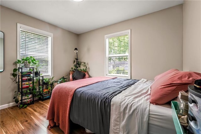 7041 Garnett St, Shawnee, KS 66203 - bedroom with wood finished floors and baseboards